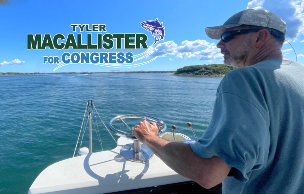 A man in a light blue shirt and cap steers a boat on a sunny day, with a clear blue sky and water, featuring the text “TYLER MACALLISTER FOR CONGRESS” and a fish logo, symbolizing his connection to the region’s fishing community.